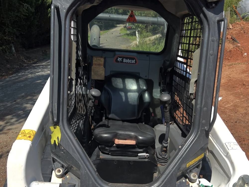 After: clean Bobcat cab interior and seat